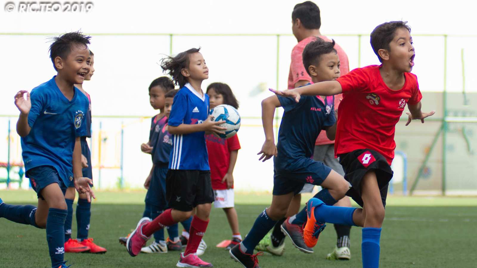 A love for football unites the young and old at Admiralty