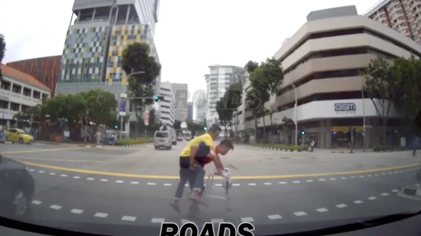 To ensure his safety, DHL driver piggybacks elderly man across the road