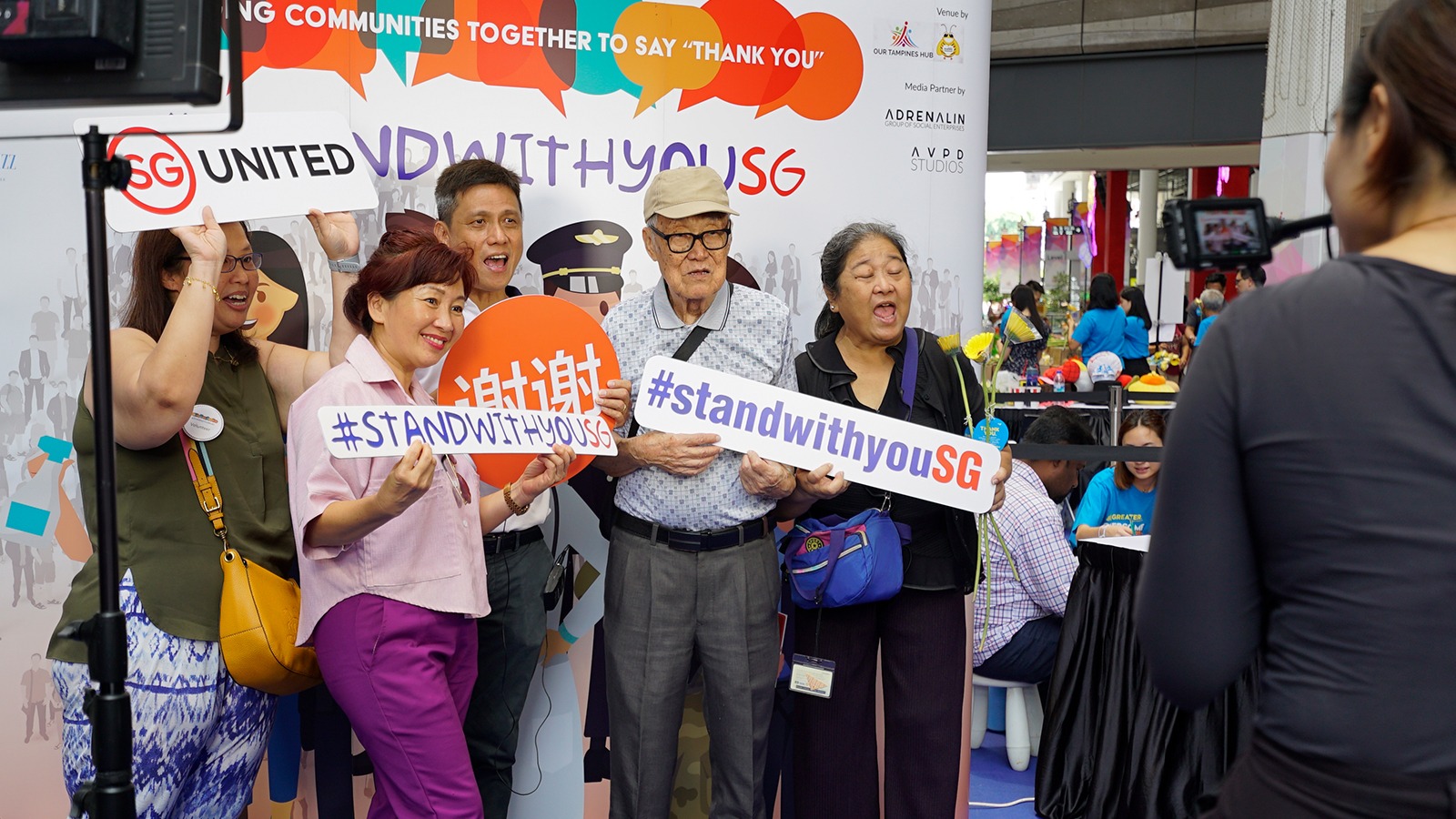 , Singaporeans stand together to Overcome as One