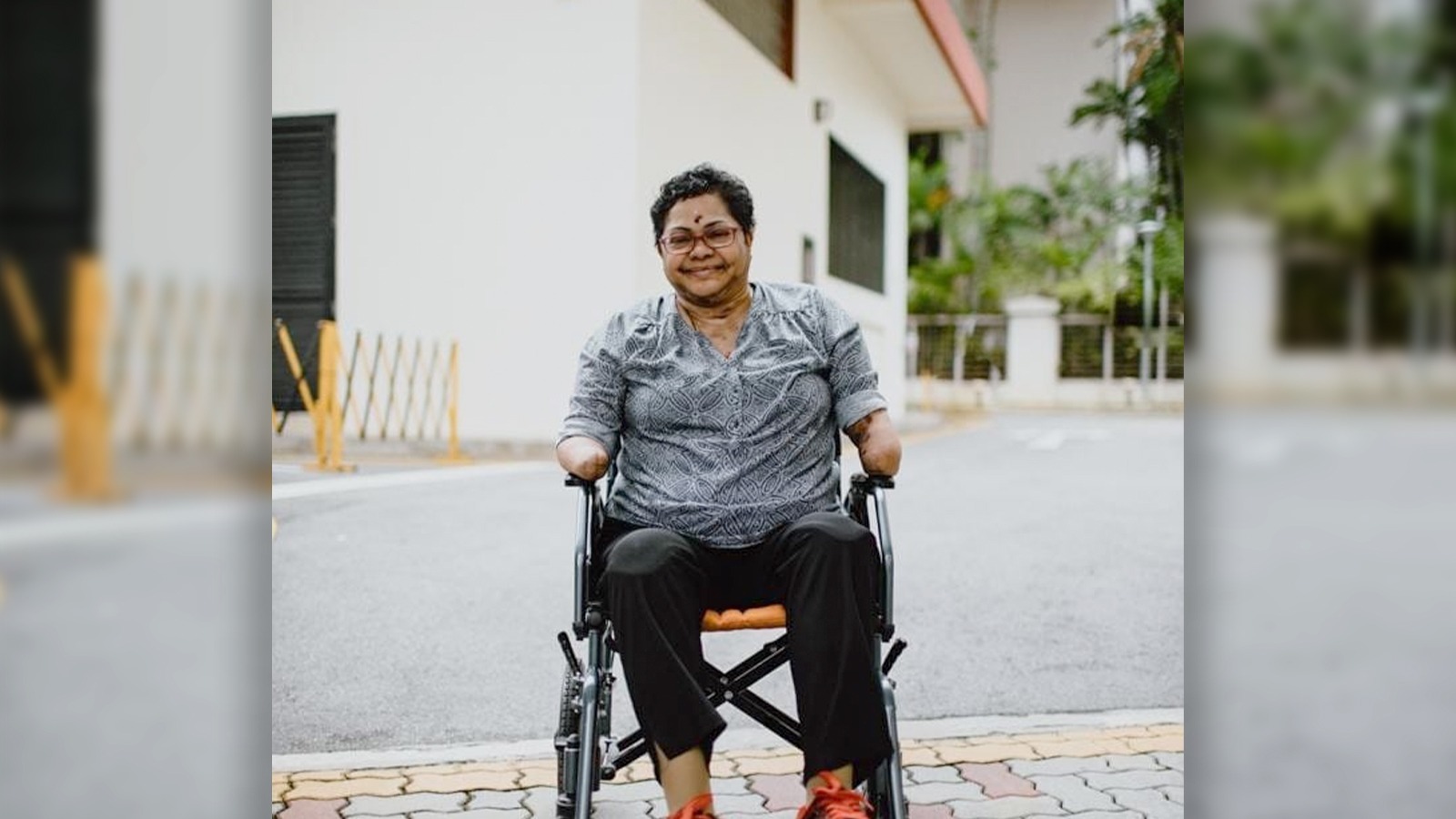 An infection caused this nurse to lose her limbs. But she refuses to let her disability weigh her down