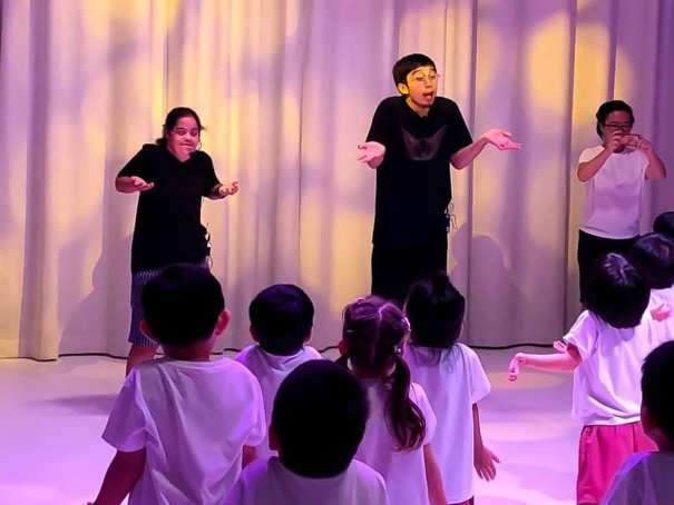 Subastian and special needs dancers conducting a childrens' class