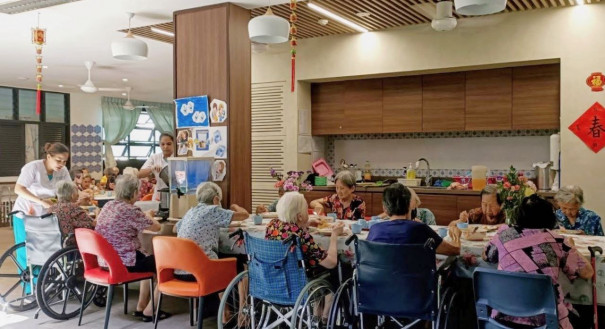 Residents having lunch at the common area