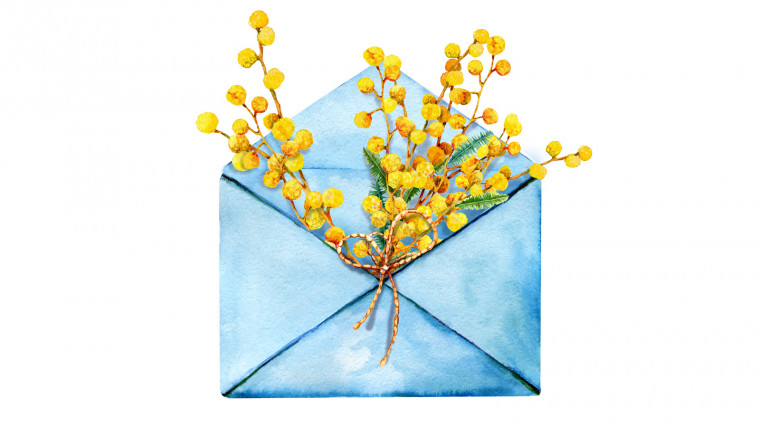 a letter with flowers in it