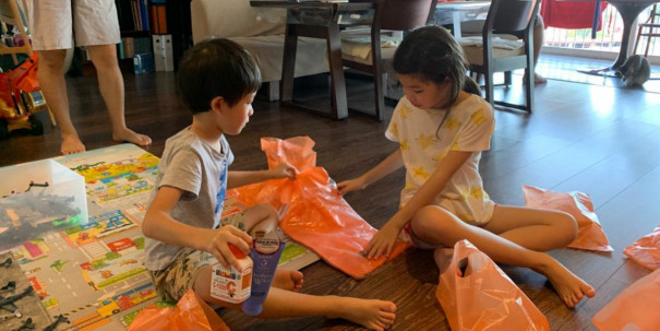 Eunice's children packing goodie bags