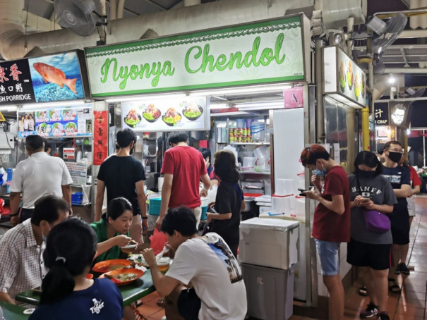 Queing is part of hawker culture and past time in Singapore