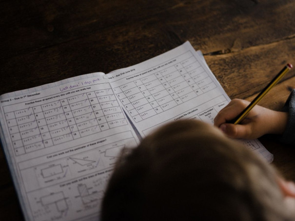 Child completing math homework