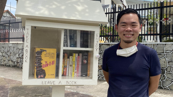 Bryan Lim with his Little Free Library at Wolskel Road
