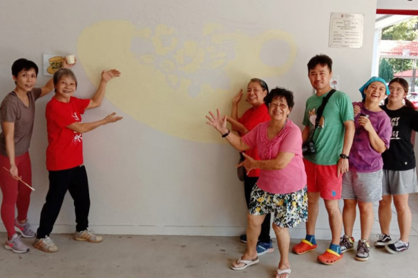 Volunteers working on Dementia care murals