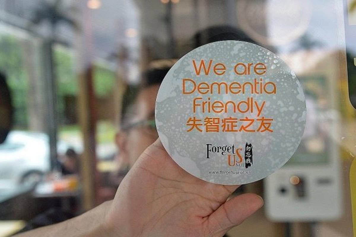 Dementia-friendly sticker promoting awareness and kindness, part of Singapore's Pride initiative by the Singapore Kindness Movement.