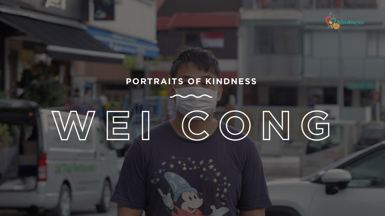 Hope and kindness in Singapore: Portrait of a man wearing a mask on the street for the Pride - Singapore Kindness Movement. Promoting compassion, inclusiveness, and community spirit to foster a more caring society.