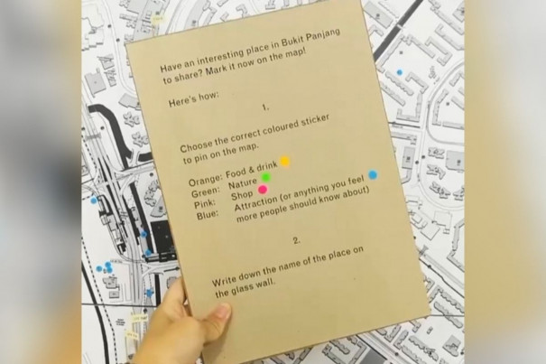 You can mark your location on a big map with coloured stickers and share your story at the Singapore Art Week 2022