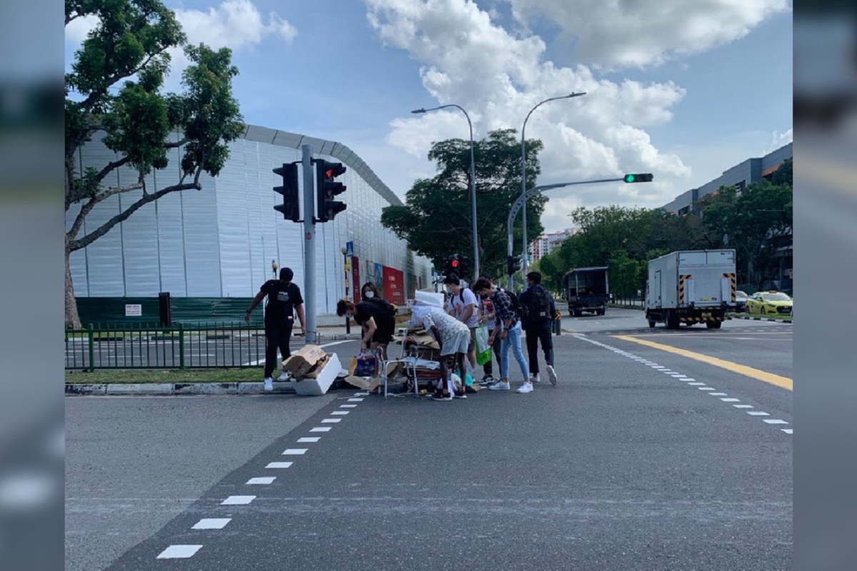 Republic Polytechnic students help an uncle who fell crossing the street