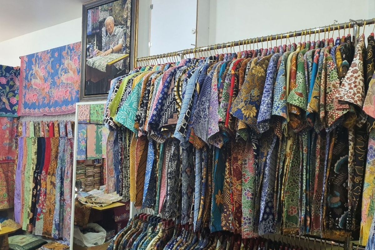 The batik clothing in the store have all been tailored by Uncle Wellie.