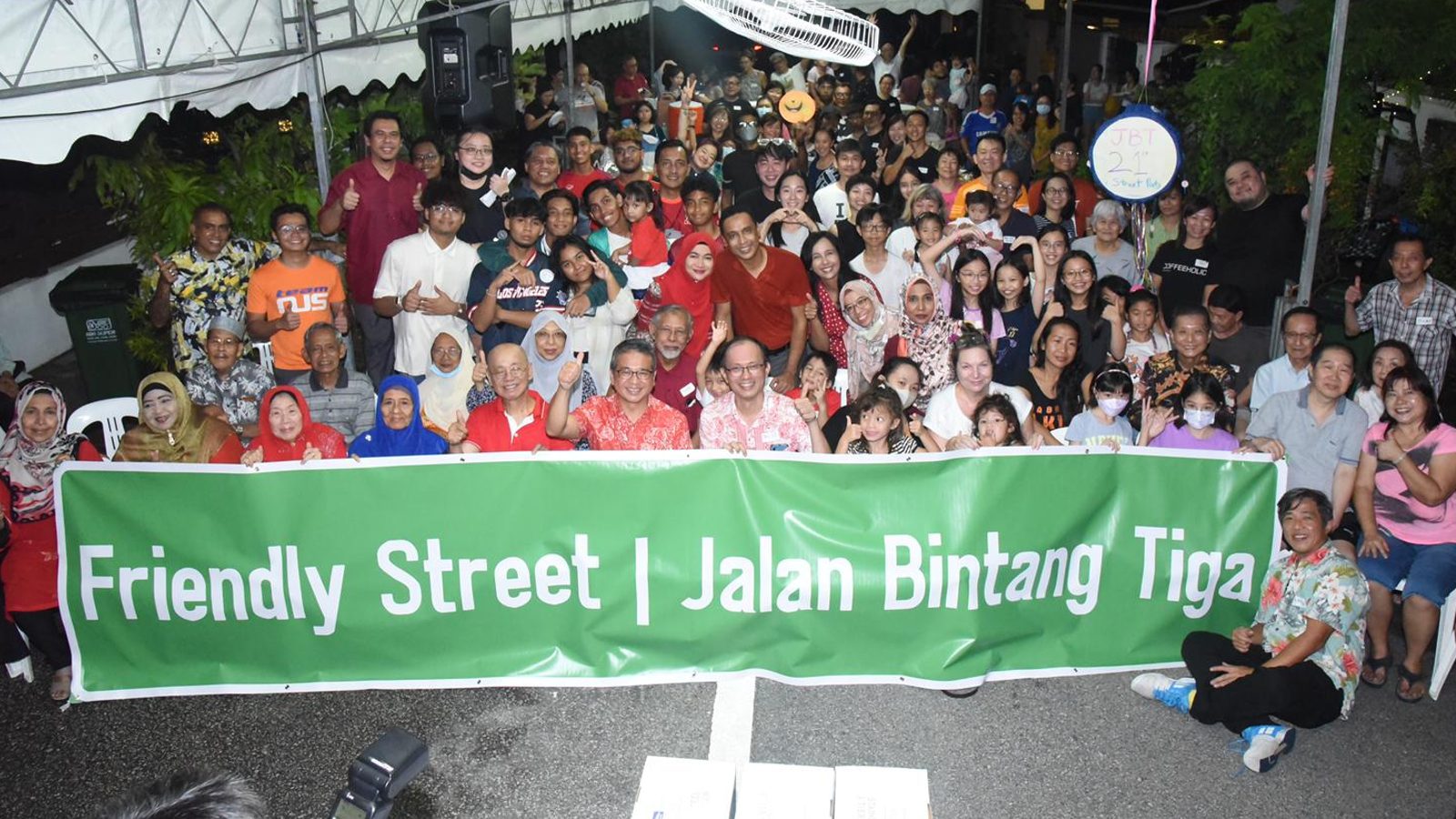 Post thumbnail of Singapore Friendly Street: Residents rekindle the kampung spirit through makan, memories and water balloon fights
