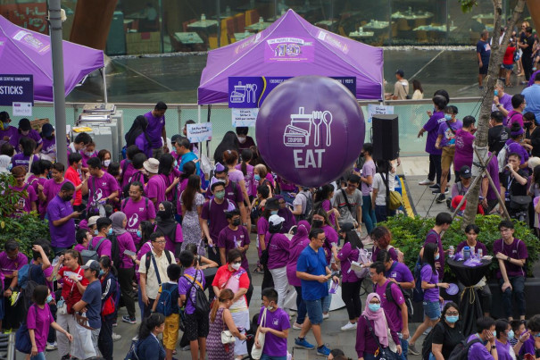 Large purple balloons labelled Eat, Play and Shop 