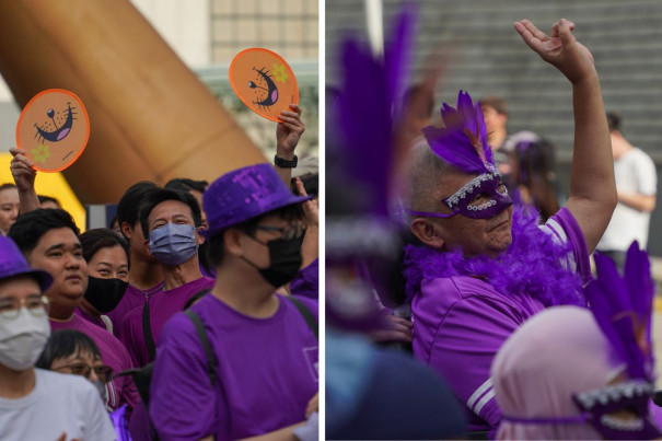 Members from Singapore Kindness Movement’s ground-up movements waved their Singa fans 
