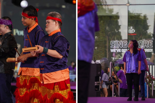 Onstage, percussion performers clad in purple and orange from Movement for the Intellectually Disabled of Singapore 
