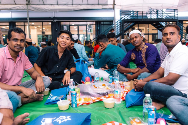 Volunteers enjoying iftar with migrant workers